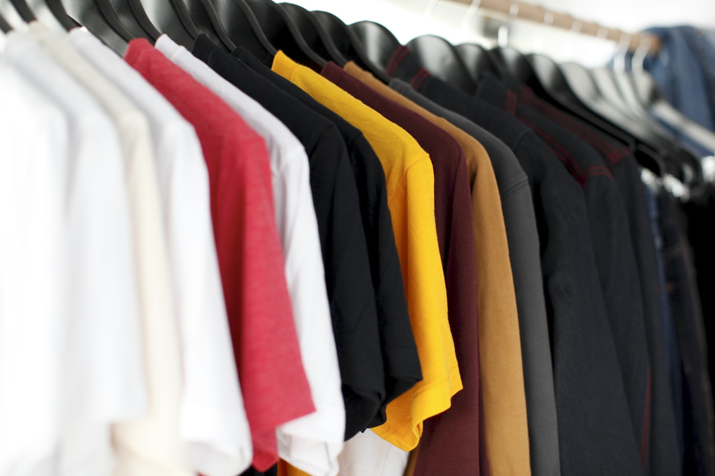 A rail of colour-blocked printed garments