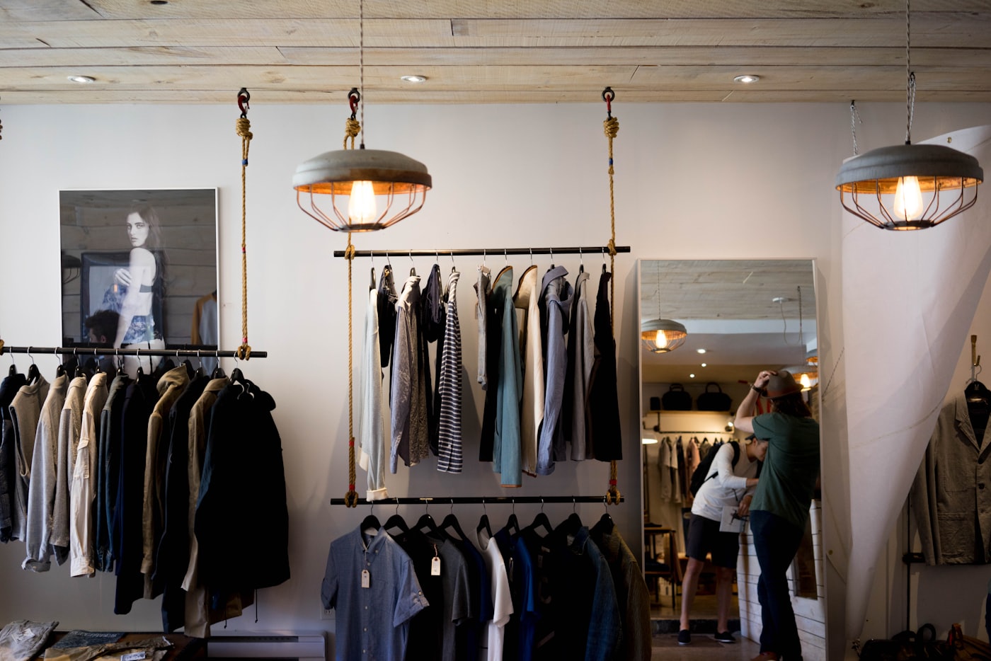 A retail interior with hanging garments